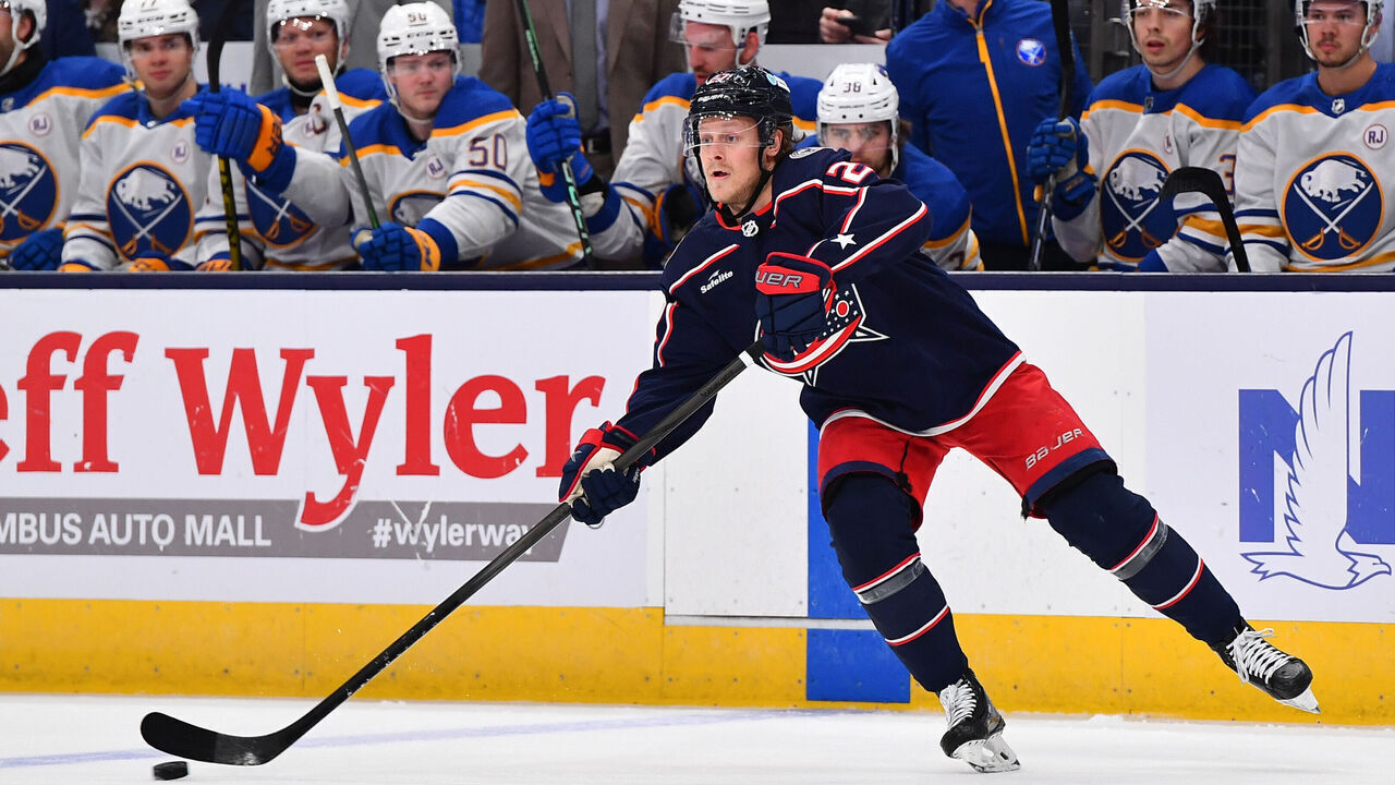 COLUMBUS, OHIO - FEBRUARY 23: Adam Boqvist #27 of the Columbus Blue Jackets passes the puck during the first period of a game against the Buffalo Sabres at Nationwide Arena on February 23, 2024 in Columbus, Ohio.