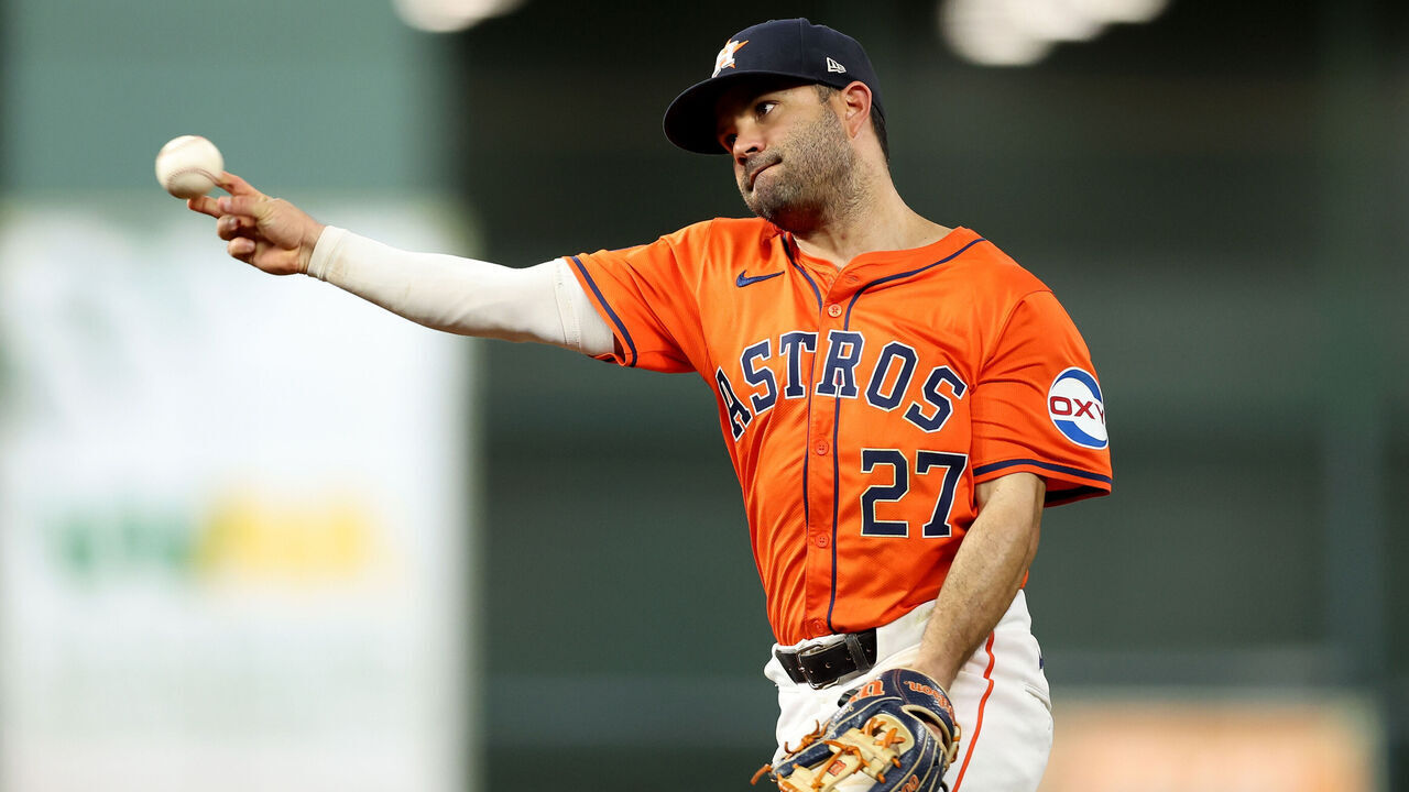 HOUSTON, TEXAS - JUNE 21: Jose Altuve #27 of the Houston Astros throws to first for an out in the ninth inning against the Baltimore Orioles at Minute Maid Park on June 21, 2024 in Houston, Texas.
