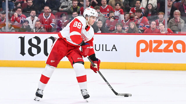 MONTREAL, CANADA - APRIL 16: Patrick Kane #88 of the Detroit Red Wings makes his approach with the puck during the shootout against the Montreal Canadiens at the Bell Centre on April 16, 2024 in Montreal, Quebec, Canada. The Detroit Red Wings defeated the Montreal Canadiens 5-4 in a shootout.