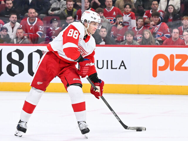 MONTREAL, CANADA - APRIL 16: Patrick Kane #88 of the Detroit Red Wings makes his approach with the puck during the shootout against the Montreal Canadiens at the Bell Centre on April 16, 2024 in Montreal, Quebec, Canada. The Detroit Red Wings defeated the Montreal Canadiens 5-4 in a shootout.