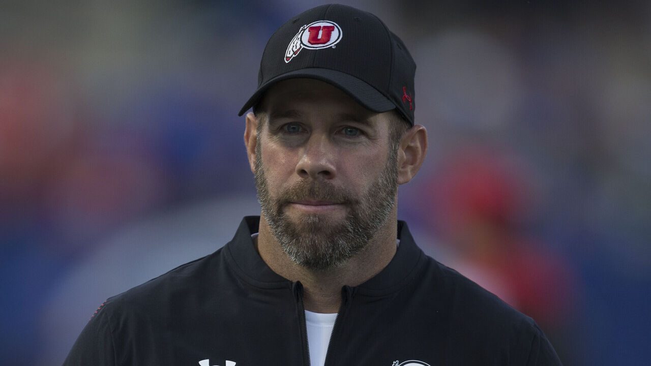 PROVO, UT - SEPTEMBER 11 : Defensive coordinator Morgan Scalley of the Utah Utes watches warmups before their game against the BYU Cougars September 11, 2021 at LaVell Edwards Stadium in Logan, Utah.