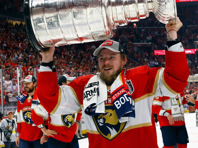 SUNRISE, FLORIDA - JUNE 24: Vladimir Tarasenko #10 of the Florida Panthers celebrates with the Stanley Cup following a 2-1 victory over the Edmonton Oilers in Game Seven of the 2024 NHL Stanley Cup Final at Amerant Bank Arena on June 24, 2024 in Sunrise, Florida.