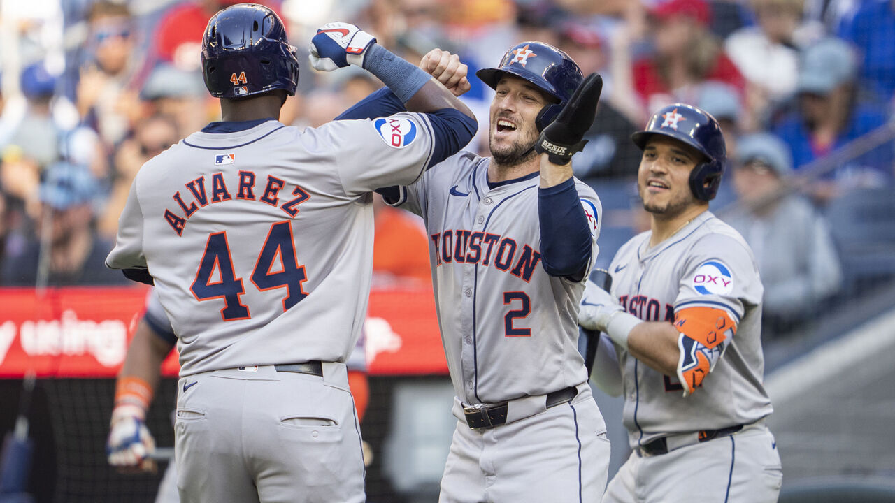 TORONTO, ON - JULY 1: Yordan Alvarez #44 of the Houston Astros celebrates his two run home run with Alex Bregman #2 against the Toronto Blue Jays in their MLB game at the Rogers Centre on July 1, 2024 in Toronto, Ontario, Canada.