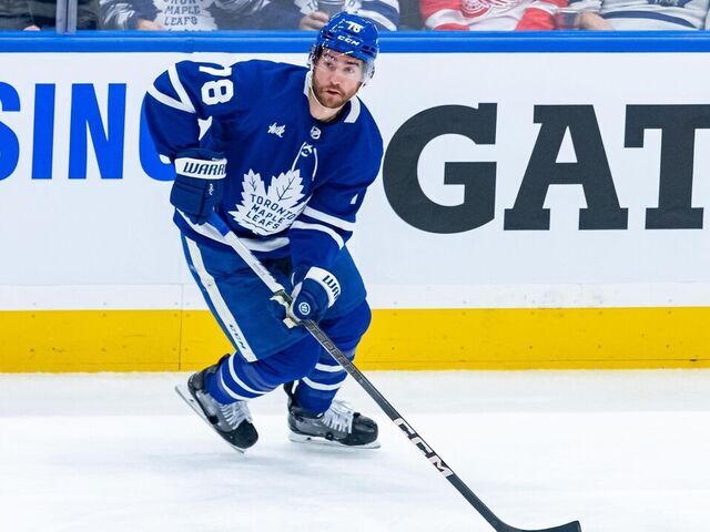TORONTO, ON - APRIL 13: Toronto Maple Leafs Defenceman T.J. Brodie (78) skates with the puck during the NHL regular season game between the Detroit Red Wings and the Toronto Maple Leafs on April 13, 2024, at Scotiabank Arena in Toronto, ON, Canada.