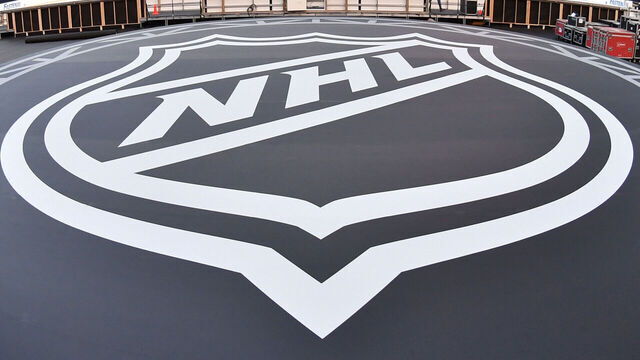 EDMONTON, CANADA - OCTOBER 25: A view of the NHL logo on a stage at Commonwealth Stadium in advance of the 2023 Tim Hortons NHL Heritage Classic on October 25, 2023, in Edmonton, Alberta, Canada.