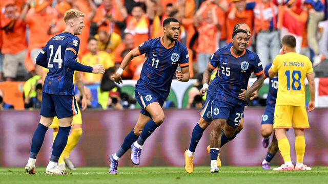 MUNICH, GERMANY - JULY 02: Cody Gakpo of the Netherlands celebrates scoring his team's first goal with teammates during the UEFA EURO 2024 round of 16 match between Romania and Netherlands at Munich Football Arena on July 02, 2024 in Munich, Germany.