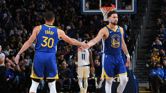 SAN FRANCISCO, CA - APRIL 2: Stephen Curry #30 and Klay Thompson #11 of the Golden State Warriors high five during the game against the Dallas Mavericks on April 2, 2024 at Chase Center in San Francisco, California. NOTE TO USER: User expressly acknowledges and agrees that, by downloading and or using this photograph, user is consenting to the terms and conditions of Getty Images License Agreement. Mandatory Copyright Notice: Copyright 2024 NBAE