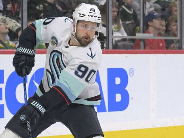ST. PAUL, MN - APRIL 18: Seattle Kraken forward Tomas Tatar (90) makes a pass during an NHL game between the Minnesota Wild and Seattle Kraken on April 18, 2024, at Xcel Energy Center in St. Paul, MN.