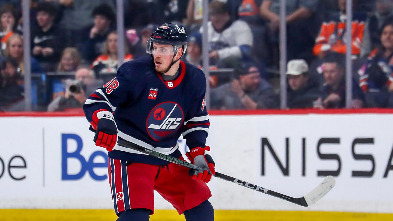 WINNIPEG, CANADA - MARCH 26: Nate Schmidt #88 of the Winnipeg Jets keeps an eye on the play during first period action against the Edmonton Oilers at the Canada Life Centre on March 26, 2024 in Winnipeg, Manitoba, Canada. The Oilers defeated the Jets 4-3 in overtime.