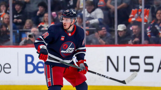 WINNIPEG, CANADA - MARCH 26: Nate Schmidt #88 of the Winnipeg Jets keeps an eye on the play during first period action against the Edmonton Oilers at the Canada Life Centre on March 26, 2024 in Winnipeg, Manitoba, Canada. The Oilers defeated the Jets 4-3 in overtime.