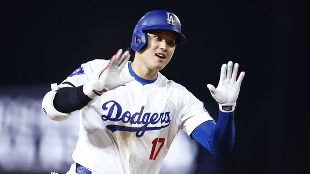 LOS ANGELES, CALIFORNIA - JULY 02: Shohei Ohtani #17 of the Los Angeles Dodgers hits a two-run home run against the Arizona Diamondback in the seventh inning at Dodger Stadium on July 02, 2024 in Los Angeles, California.