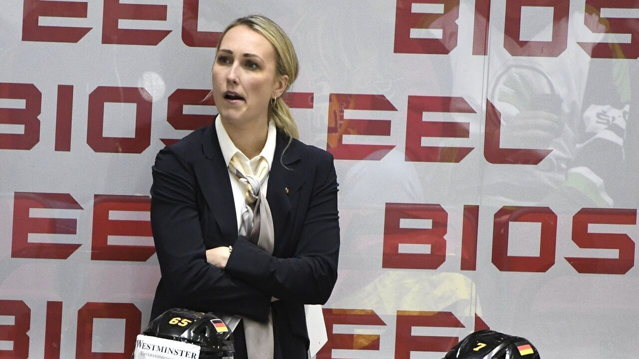 Germany's Canadian Assistant Coach Jessica Campbell follows the action during the 2022 IIHF Ice Hockey World Championships preliminary round group A match between Germany and Denmark in Helsinki on May 19, 2022. - Finland OUT