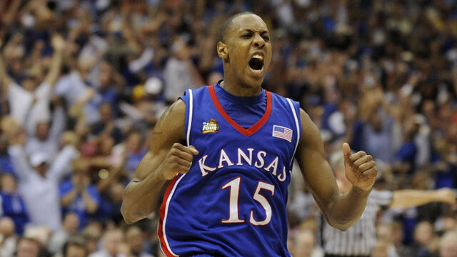 07 APR 2008: Mario Chalmers (15) of the University of Kansas celebrates after hitting a three point basket to send the game into overtime during the Division I Men's Final Four Basketball Championship Game held at the Alamodome in San Antonio, TX. Kansas defeated Memphis 75-68 to claim the championship title. Ryan McKee/NCAA Photos via Getty Images