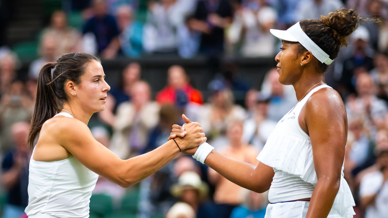 LONDON, ENGLAND - JULY 03: Emma Navarro of the United States and Naomi Osaka of Japan shake hands at the net after the second round on Day Three of The Championships Wimbledon 2024 at All England Lawn Tennis and Croquet Club on July 03, 2024 in London, England