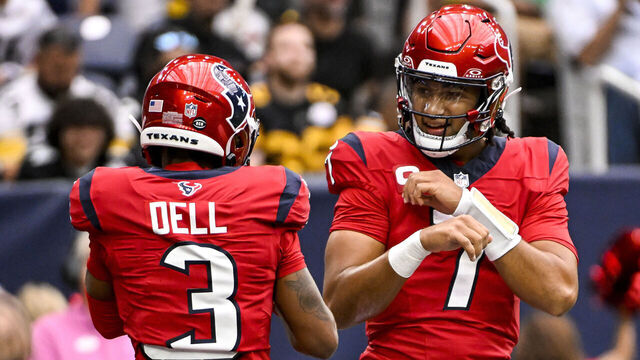 HOUSTON, TEXAS - OCTOBER 01: C.J. Stroud #7 celebrates with Tank Dell #3 of the Houston Texans after defeating the Pittsburgh Steelers at NRG Stadium on October 01, 2023 in Houston, Texas.