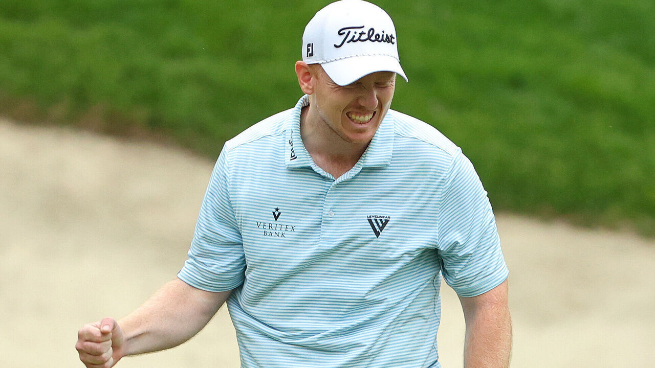 SILVIS, ILLINOIS - JULY 04: Hayden Springer of the United States reacts after a birdie putt on the 18th hole for a score of 59 in the first round of the John Deere Classic at TPC Deere Run on July 04, 2024 in Silvis, Illinois.