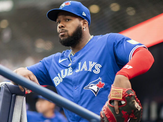 TORONTO, ON - JULY 2: Vladimir Guerrero Jr. #27 of Toronto Blue Jays looks on from the dugout before playing the Houston Astros in their MLB game at the Rogers Centre on July 2, 2024 in Toronto, Ontario, Canada.