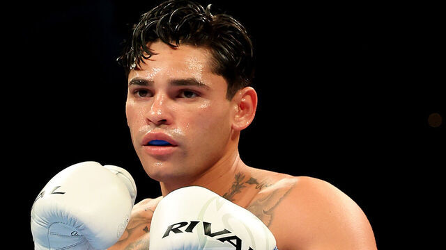 NEW YORK, NEW YORK - APRIL 20: Ryan Garcia (white trunks) prepares to fight Devin Haney during their WBC Super Lightweight title bout at Barclays Center on April 20, 2024 in New York City.