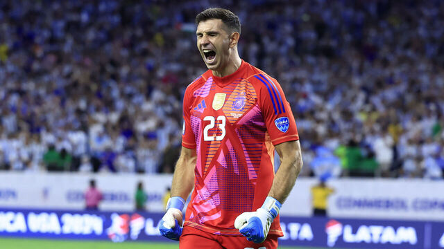 HOUSTON, TEXAS - JULY 04: Emiliano Martinez of Argentina saves the second penalty from Alan Minda of Ecuador (not in frame) in the penalty shoot out during the CONMEBOL Copa America 2024 quarter-final match between Argentina and Ecuador at NRG Stadium on July 04, 2024 in Houston, Texas.