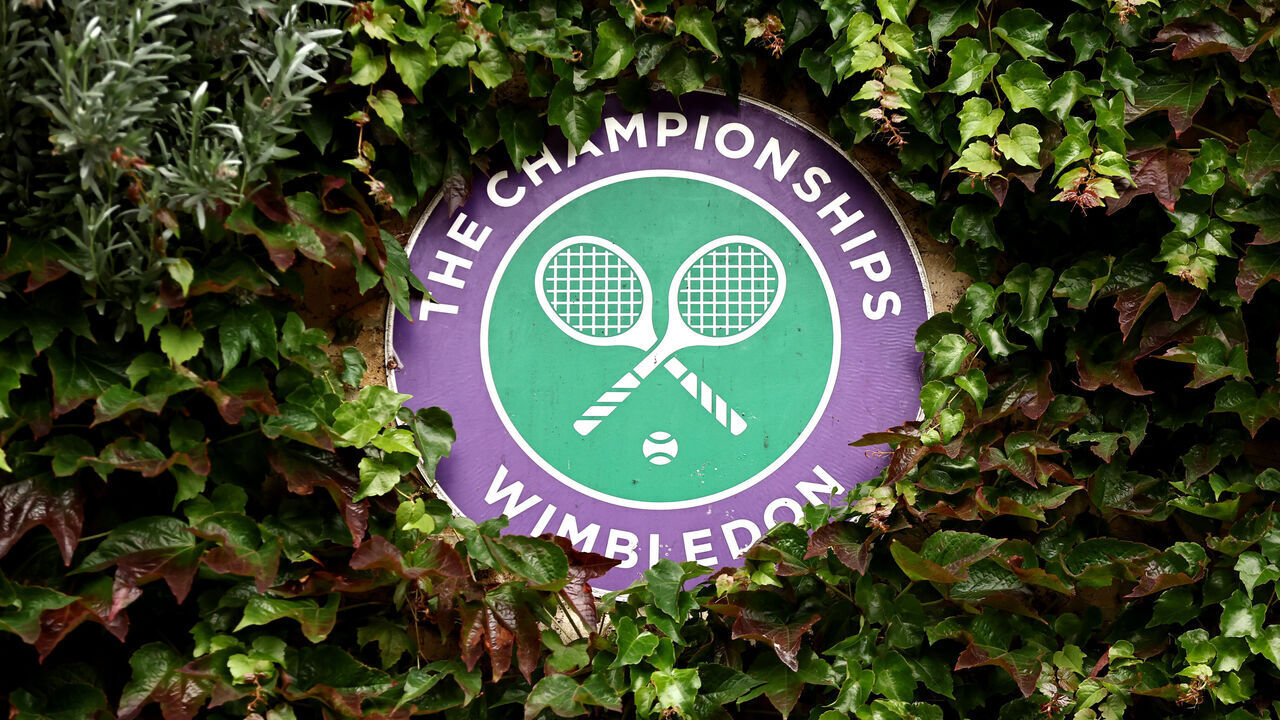 LONDON, ENGLAND - JULY 03: A detailed view of The Championships Wimbledon logo seen on a wall during day three of The Championships Wimbledon 2024 at All England Lawn Tennis and Croquet Club on July 03, 2024 in London, England.