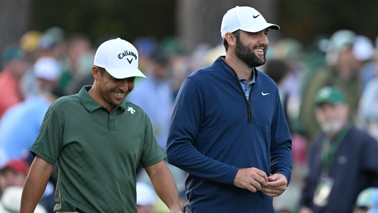 AUGUSTA, GEORGIA - APRIL 12: Scottie Scheffler and Xander Schauffele laugh together while walking off the 17th tee box during the second round of Masters Tournament at Augusta National Golf Club on April 12, 2024 in Augusta, Georgia.