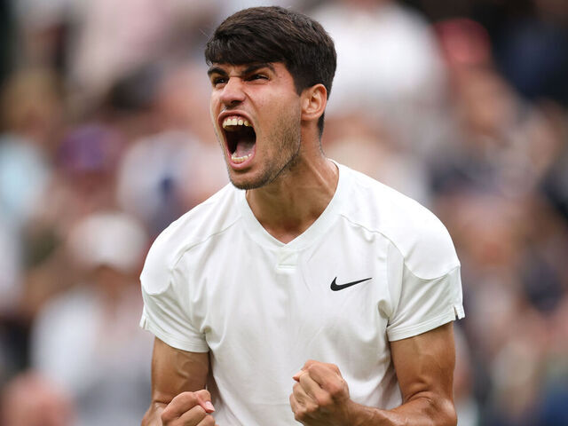 LONDON, ENGLAND - JULY 05: Carlos Alcaraz of Spain celebrates winning match point against Frances Tiafoe of United States in his Gentlemen's Singles third round match during day five of The Championships Wimbledon 2024 at All England Lawn Tennis and Croquet Club on July 05, 2024 in London, England.