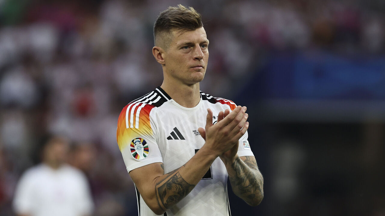 STUTTGART, GERMANY - JULY 5: Toni Kroos of Germany applauds the fans whilst showing dejection after the UEFA EURO 2024 quarter-final match between Spain and Germany at Stuttgart Arena on July 5, 2024 in Stuttgart, Germany.