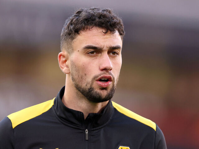 WOLVERHAMPTON, ENGLAND - APRIL 24: Max Kilman of Wolverhampton Wanderers looks on as he warms up prior to the Premier League match between Wolverhampton Wanderers and AFC Bournemouth at Molineux on April 24, 2024 in Wolverhampton, England.