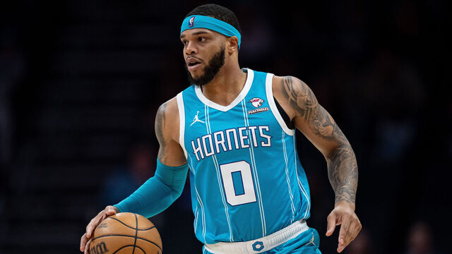 CHARLOTTE, NORTH CAROLINA - APRIL 05: Miles Bridges #0 of the Charlotte Hornets brings the ball up court against the Orlando Magic during their game at Spectrum Center on April 05, 2024 in Charlotte, North Carolina.