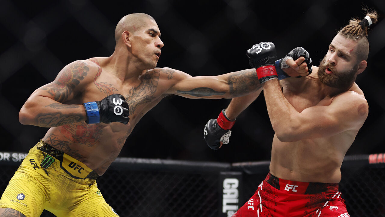 NEW YORK, NEW YORK - NOVEMBER 11: Alex Pereira of Brazil punches Jiri Prochazka of the Czech Republic in the UFC light heavyweight championship fight during the UFC 295 event at Madison Square Garden on November 11, 2023 in New York City.