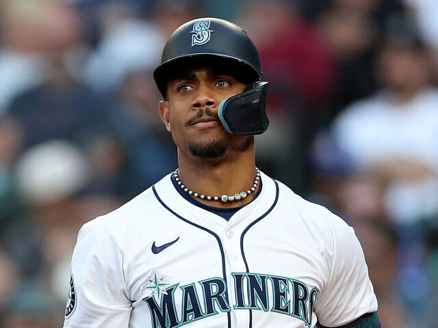 SEATTLE, WASHINGTON - JULY 02: Julio Rodríguez #44 of the Seattle Mariners reacts after a strike against the Baltimore Orioles at T-Mobile Park on July 02, 2024 in Seattle, Washington.