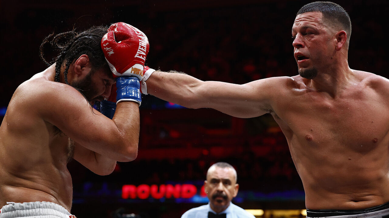 ANAHEIM, CALIFORNIA - JULY 06: (L-R) Jorge Masvidal and Nate Diaz during round nine of their cruiserweights fight at Honda Center on July 06, 2024 in Anaheim, California.