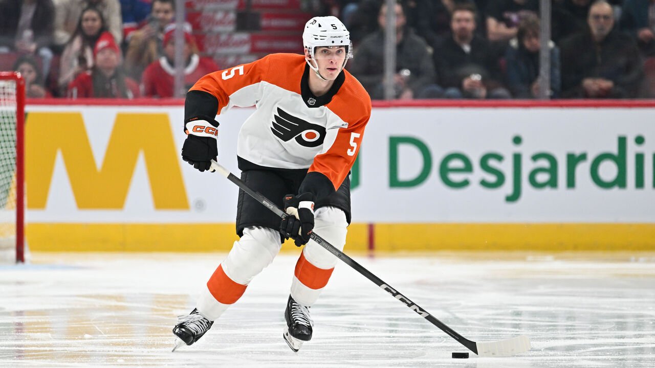 MONTREAL, CANADA - MARCH 28: Egor Zamula #5 of the Philadelphia Flyers skates the puck during the third period against the Montreal Canadiens at the Bell Centre on March 28, 2024 in Montreal, Quebec, Canada. The Montreal Canadiens defeated the Philadelphia Flyers 4-1.