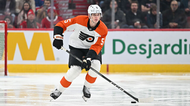 MONTREAL, CANADA - MARCH 28: Egor Zamula #5 of the Philadelphia Flyers skates the puck during the third period against the Montreal Canadiens at the Bell Centre on March 28, 2024 in Montreal, Quebec, Canada. The Montreal Canadiens defeated the Philadelphia Flyers 4-1.