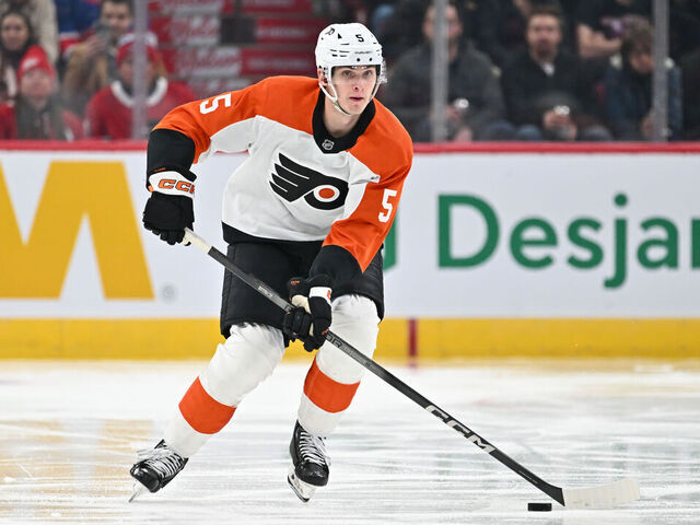 MONTREAL, CANADA - MARCH 28: Egor Zamula #5 of the Philadelphia Flyers skates the puck during the third period against the Montreal Canadiens at the Bell Centre on March 28, 2024 in Montreal, Quebec, Canada. The Montreal Canadiens defeated the Philadelphia Flyers 4-1.