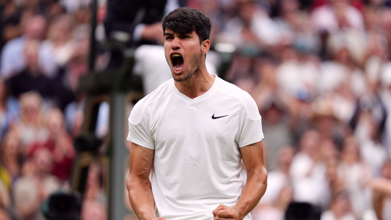 Carlos Alcaraz celebrates beating Ugo Humbert (not pictured) on day seven of the 2024 Wimbledon Championships at the All England Lawn Tennis and Croquet Club, London. Picture date: Sunday July 7, 2024.