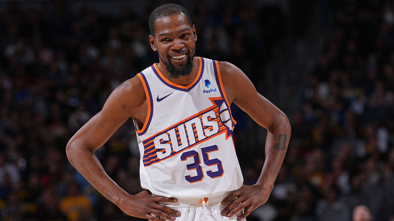 DENVER, CO - MARCH 27: Kevin Durant #35 of the Phoenix Suns smiles during the game against the Denver Nuggets on March 27, 2024 at the Ball Arena in Denver, Colorado. NOTE TO USER: User expressly acknowledges and agrees that, by downloading and/or using this Photograph, user is consenting to the terms and conditions of the Getty Images License Agreement. Mandatory Copyright Notice: Copyright 2024 NBAE