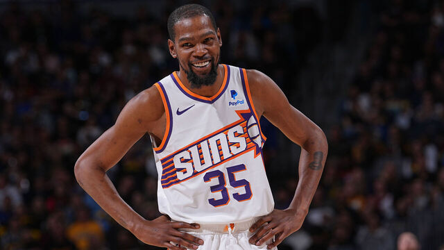 DENVER, CO - MARCH 27: Kevin Durant #35 of the Phoenix Suns smiles during the game against the Denver Nuggets on March 27, 2024 at the Ball Arena in Denver, Colorado. NOTE TO USER: User expressly acknowledges and agrees that, by downloading and/or using this Photograph, user is consenting to the terms and conditions of the Getty Images License Agreement. Mandatory Copyright Notice: Copyright 2024 NBAE