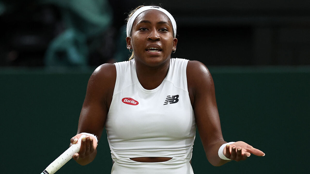 US player Coco Gauff reacts against USA's Emma Navarro during their women's singles fourth round tennis match on the seventh day of the 2024 Wimbledon Championships at The All England Lawn Tennis and Croquet Club in Wimbledon, southwest London, on July 7, 2024.