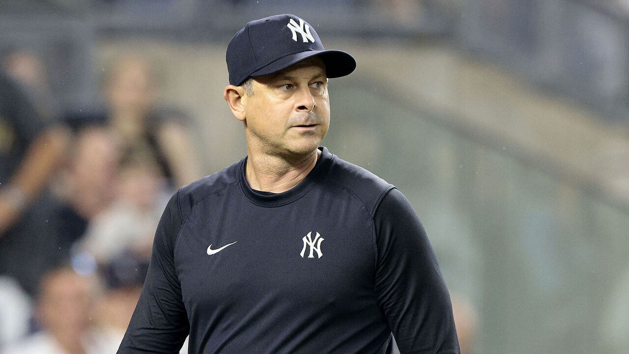 NEW YORK, NEW YORK - JUNE 22: Aaron Boone #17 of the New York Yankees walks back to the dugout after being ejected in the top of the seventh inning during the game against the Atlanta Braves at Yankee Stadium on June 22, 2024 in New York City. The Yankees defeated the Braves 8-3.