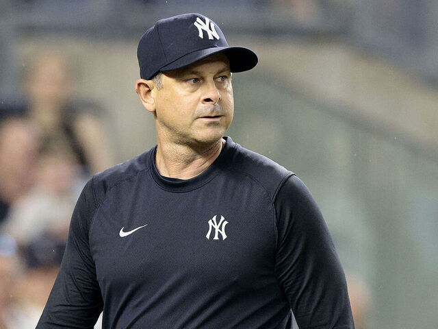 NEW YORK, NEW YORK - JUNE 22: Aaron Boone #17 of the New York Yankees walks back to the dugout after being ejected in the top of the seventh inning during the game against the Atlanta Braves at Yankee Stadium on June 22, 2024 in New York City. The Yankees defeated the Braves 8-3.