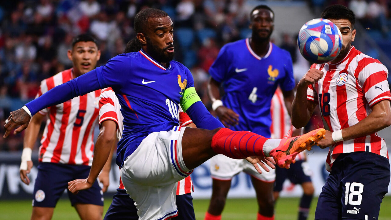France's forward #10 Alexandre Lacazette shoots the ball during the U23 friendly football match between France and Paraguay at Jean Dauger stadium in Bayonne, southwestern France, on July 4, 2024, in preparation for the Paris 2024 Olympic Games.