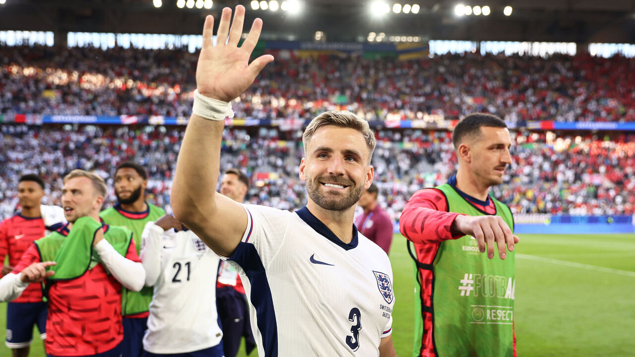 DUSSELDORF, GERMANY - JULY 06: Luke Shaw of England waves to fans following the UEFA EURO 2024 quarter-final match between England and Switzerland at Düsseldorf Arena on July 06, 2024 in Dusseldorf, Germany.