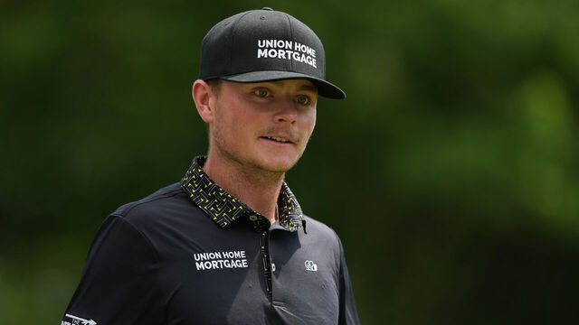 SILVIS, ILLINOIS - JULY 07: Amateur Luke Clanton of the United States walks off the second tee during the final round of the John Deere Classic at TPC Deere Run on July 07, 2024 in Silvis, Illinois.