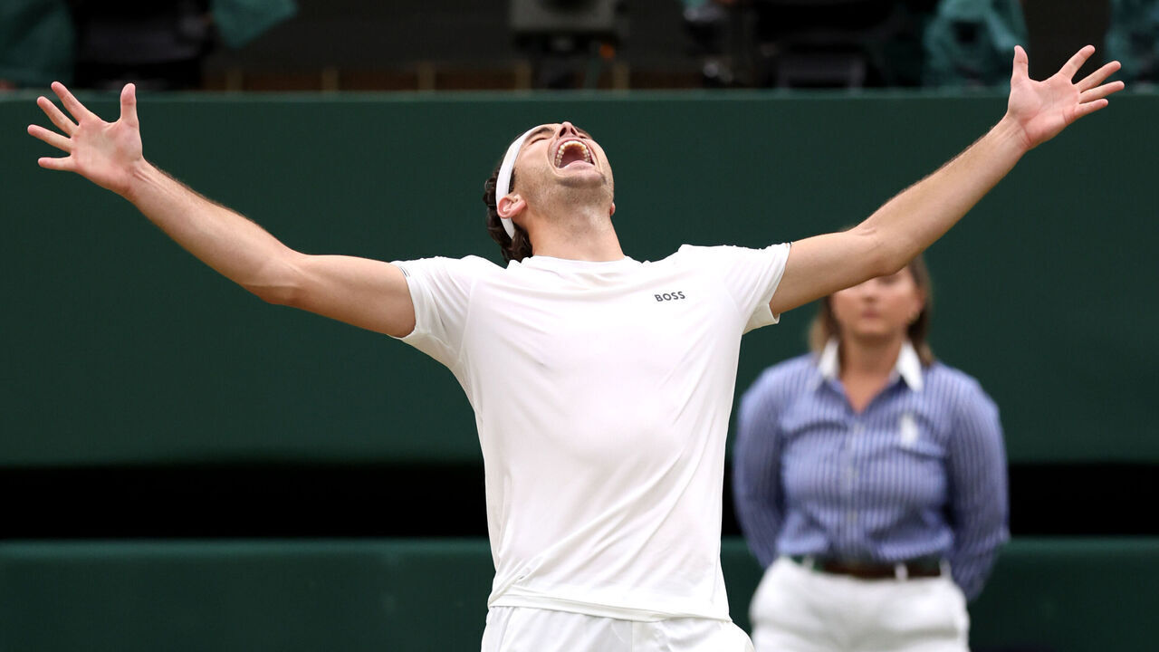 LONDON, ENGLAND - JULY 08: Taylor Fritz of United States celebrates match point against Alexander Zverev of Germany in the Gentlemen's Singles fourth round match during day eight of The Championships Wimbledon 2024 at All England Lawn Tennis and Croquet Club on July 08, 2024 in London, England.