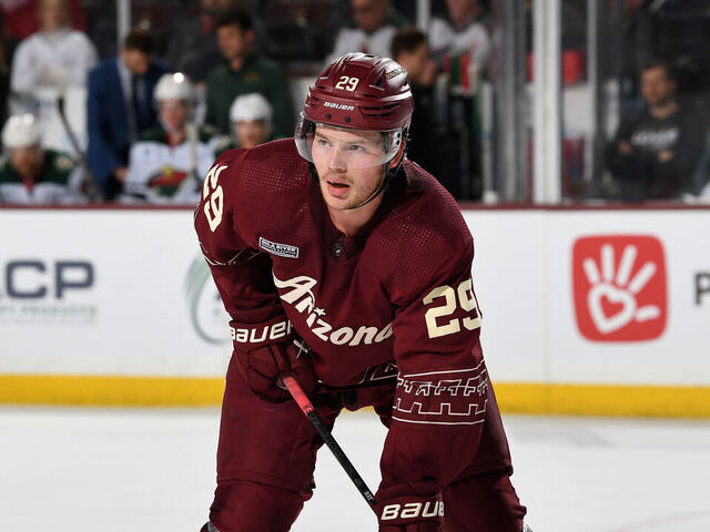 TEMPE, ARIZONA - MARCH 07: Barrett Hayton #29 of the Arizona Coyotes gets ready during a face off against the Minnesota Wild at Mullett Arena on March 07, 2024 in Tempe, Arizona.