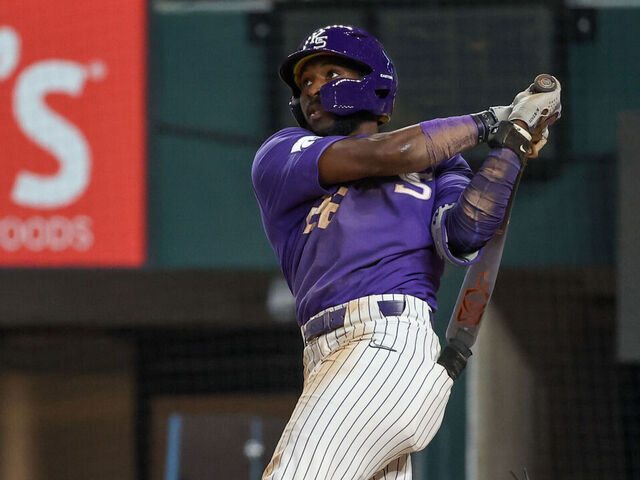 ARLINGTON, TX - MAY 21: Kansas State infielder Kaelen Culpepper (22) watches his fly ball for the final out of the 2024 Phillips 66 Big 12 Baseball Championship game between Kansas and Kansas State on May 21, 2024, at Globe Life Field in Arlington, TX.