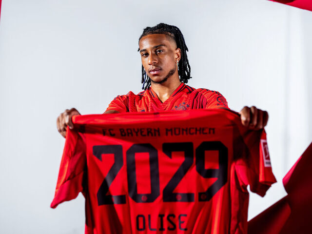 MUNICH, GERMANY - JULY 07: Michael Olise poses as he signs a contract with FC Bayern München on July 07, 2024 in Munich, Germany. The 22-year-old forward moves to Munich from English Premier League club Crystal Palace on a five-year contract valid through to 30 June 2029.
