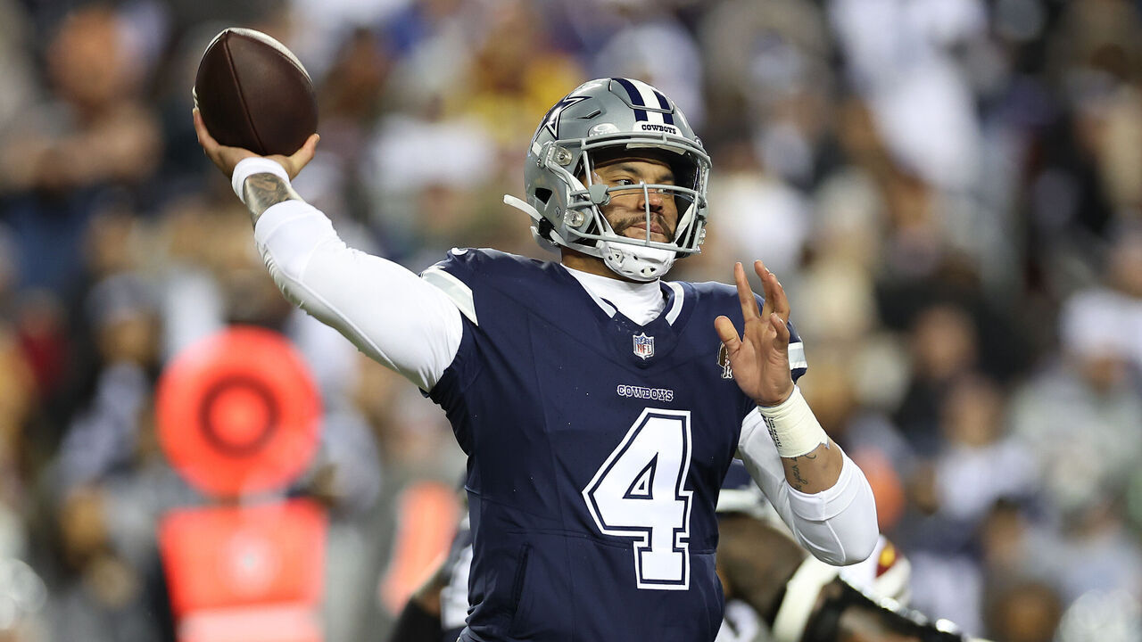 LANDOVER, MARYLAND - JANUARY 07: Dak Prescott #4 of the Dallas Cowboys attempts to pass during the second quarter against the Washington Commanders at FedExField on January 07, 2024 in Landover, Maryland.
