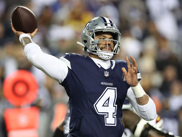 LANDOVER, MARYLAND - JANUARY 07: Dak Prescott #4 of the Dallas Cowboys attempts to pass during the second quarter against the Washington Commanders at FedExField on January 07, 2024 in Landover, Maryland.
